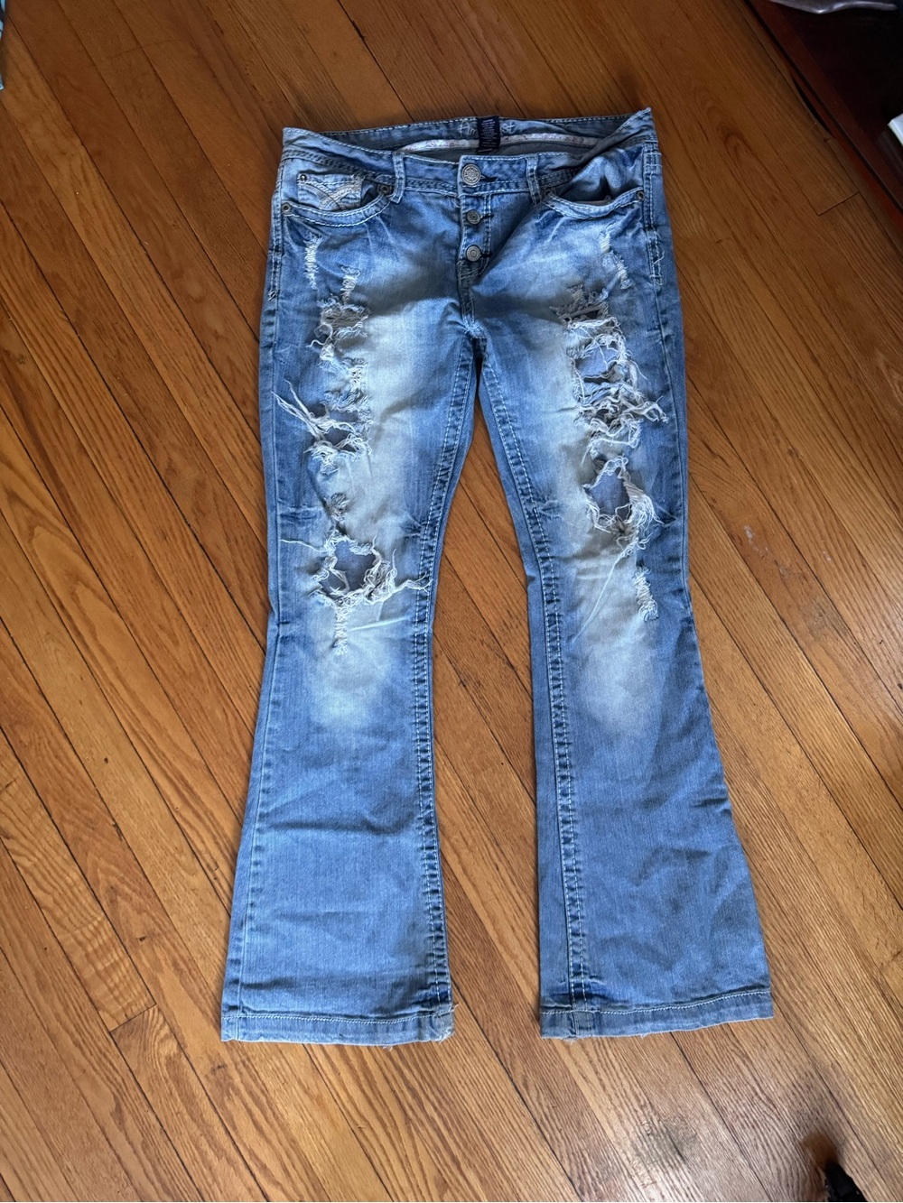 Low rise bootcut ripped jeans